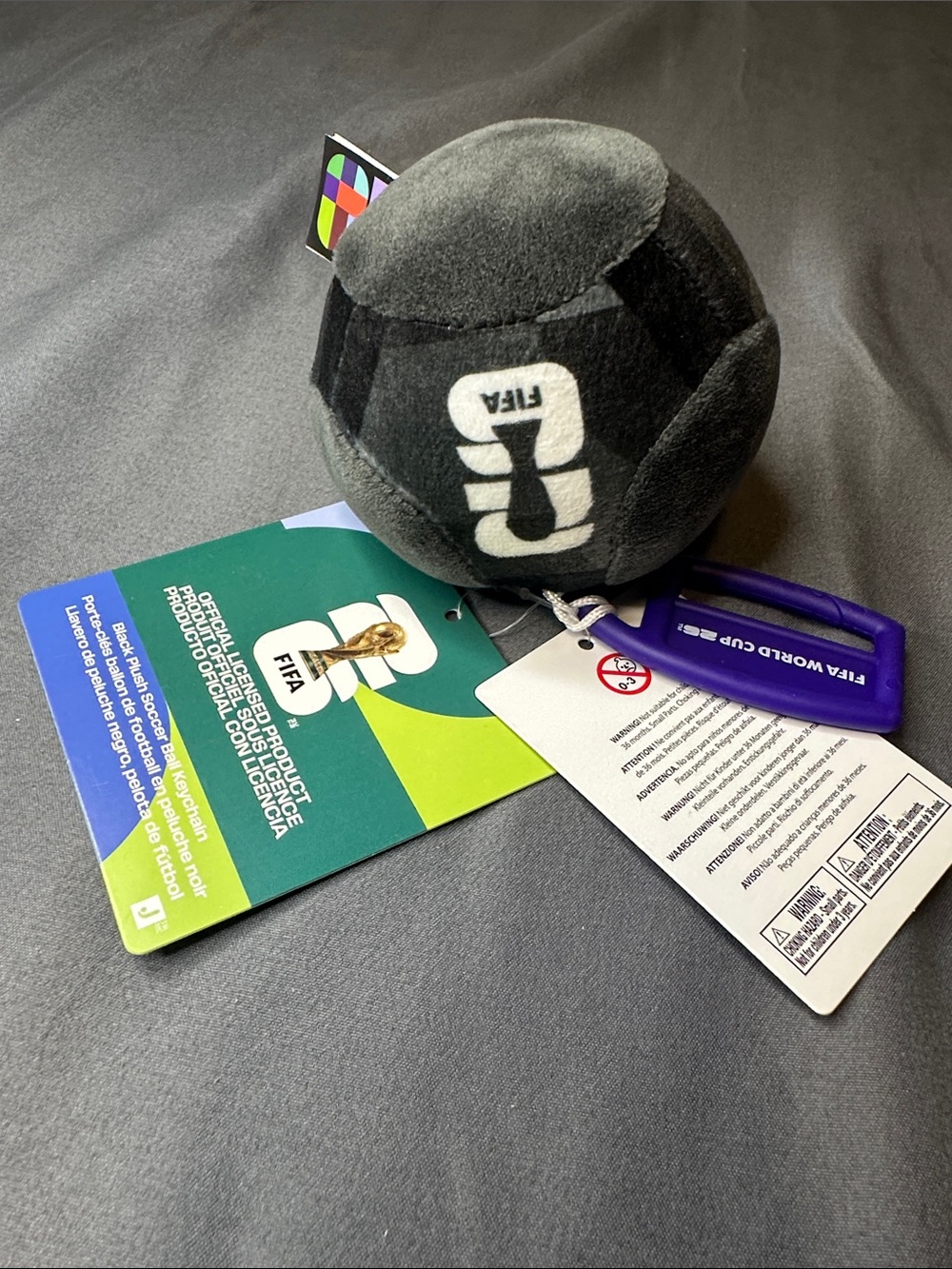 OFFICIAL FIFA 2026 Black Plush Soccer Ball Keychain with Purple Clip